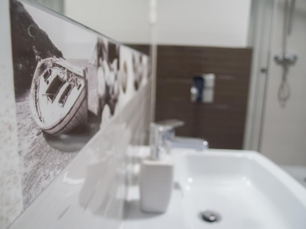 Bedroom Apartments Krzywoustego 14 Щецин Номер фото