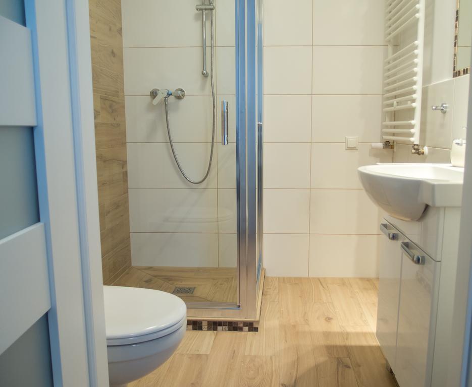 Bedroom Apartments Krzywoustego 14 Щецин Номер фото