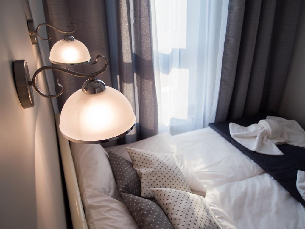 Bedroom Apartments Krzywoustego 14 Щецин Номер фото